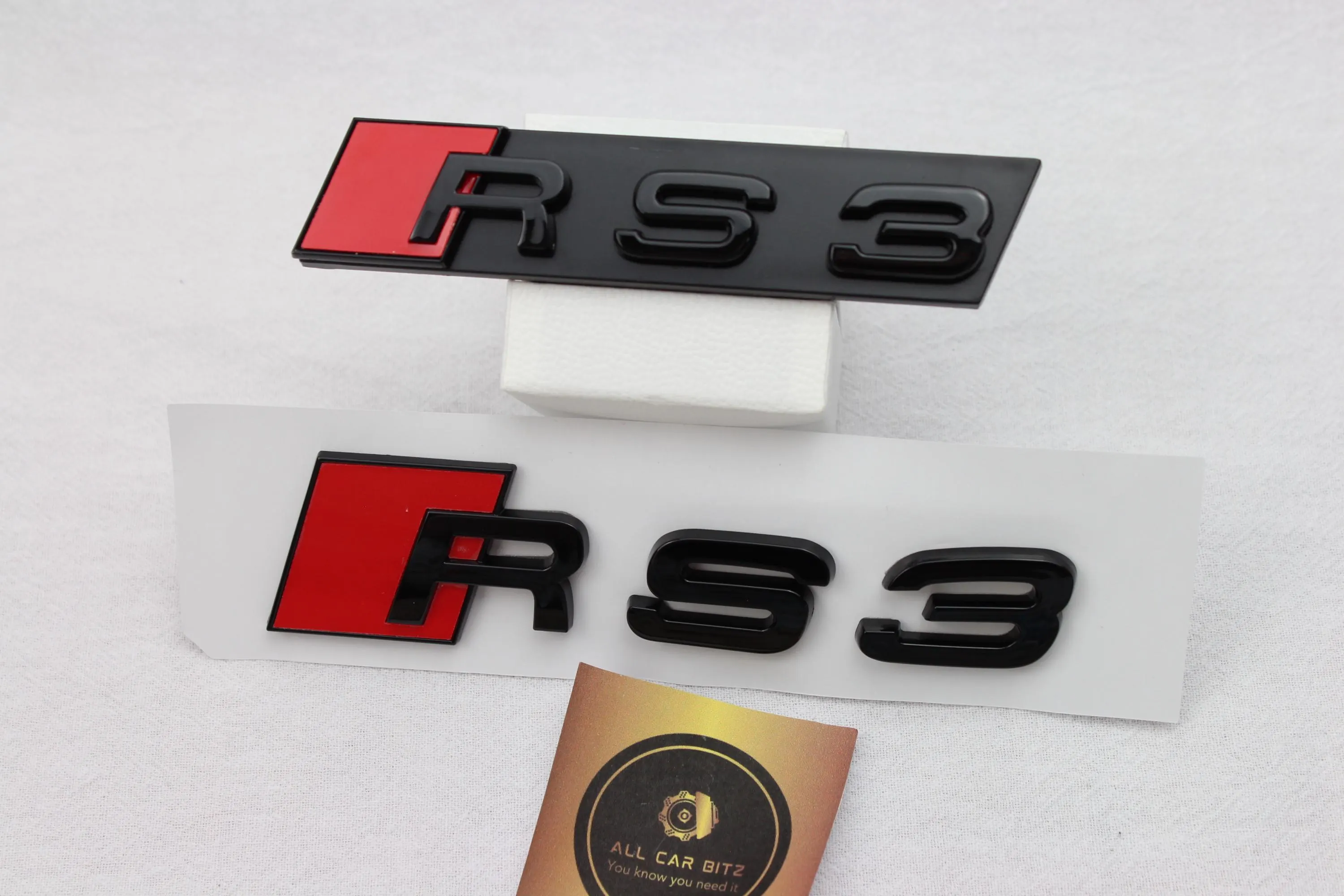 Audi RS3 Front and Rear Badge Set – Gloss Black & Red Emblems