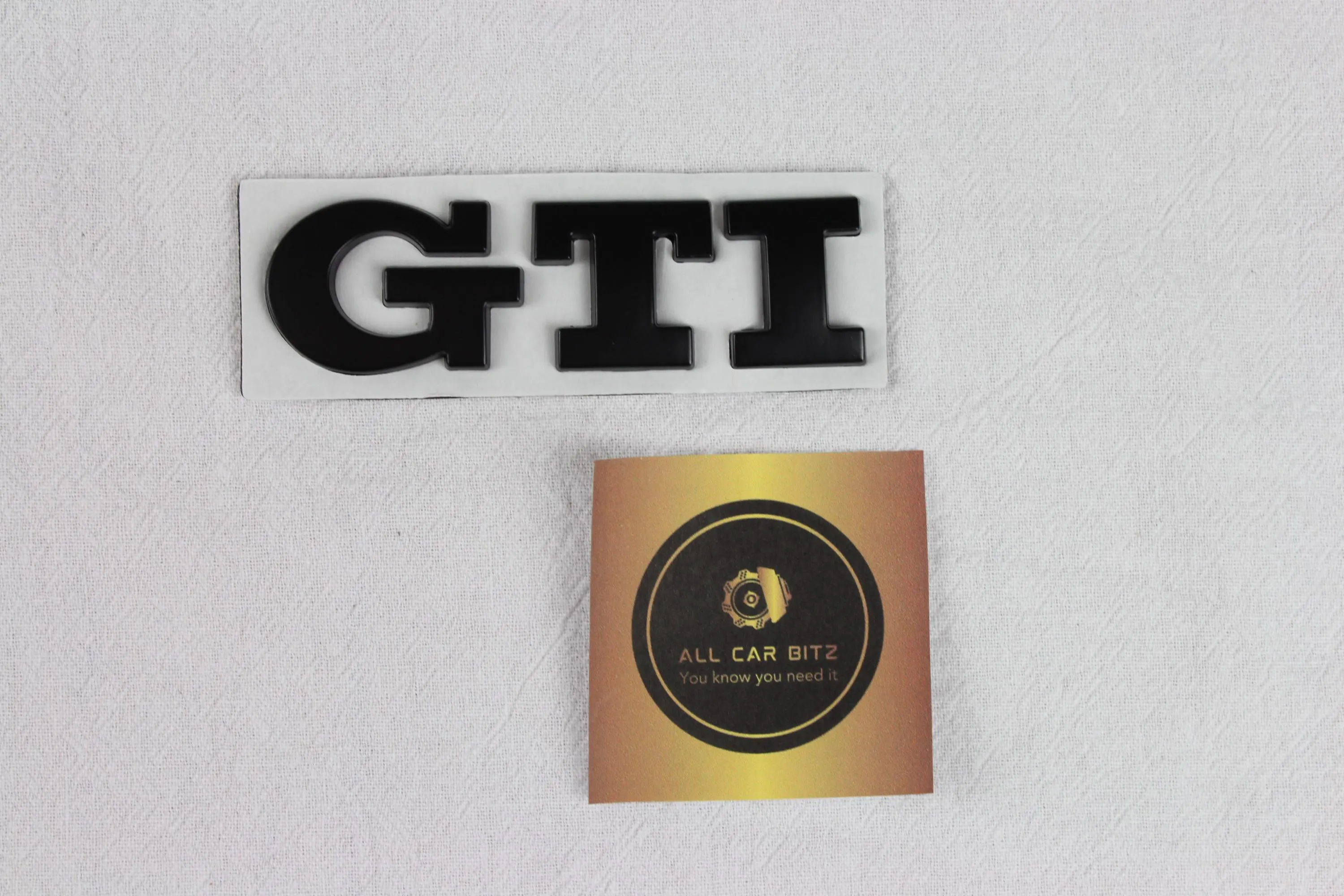 Black Volkswagen GTI logo badge