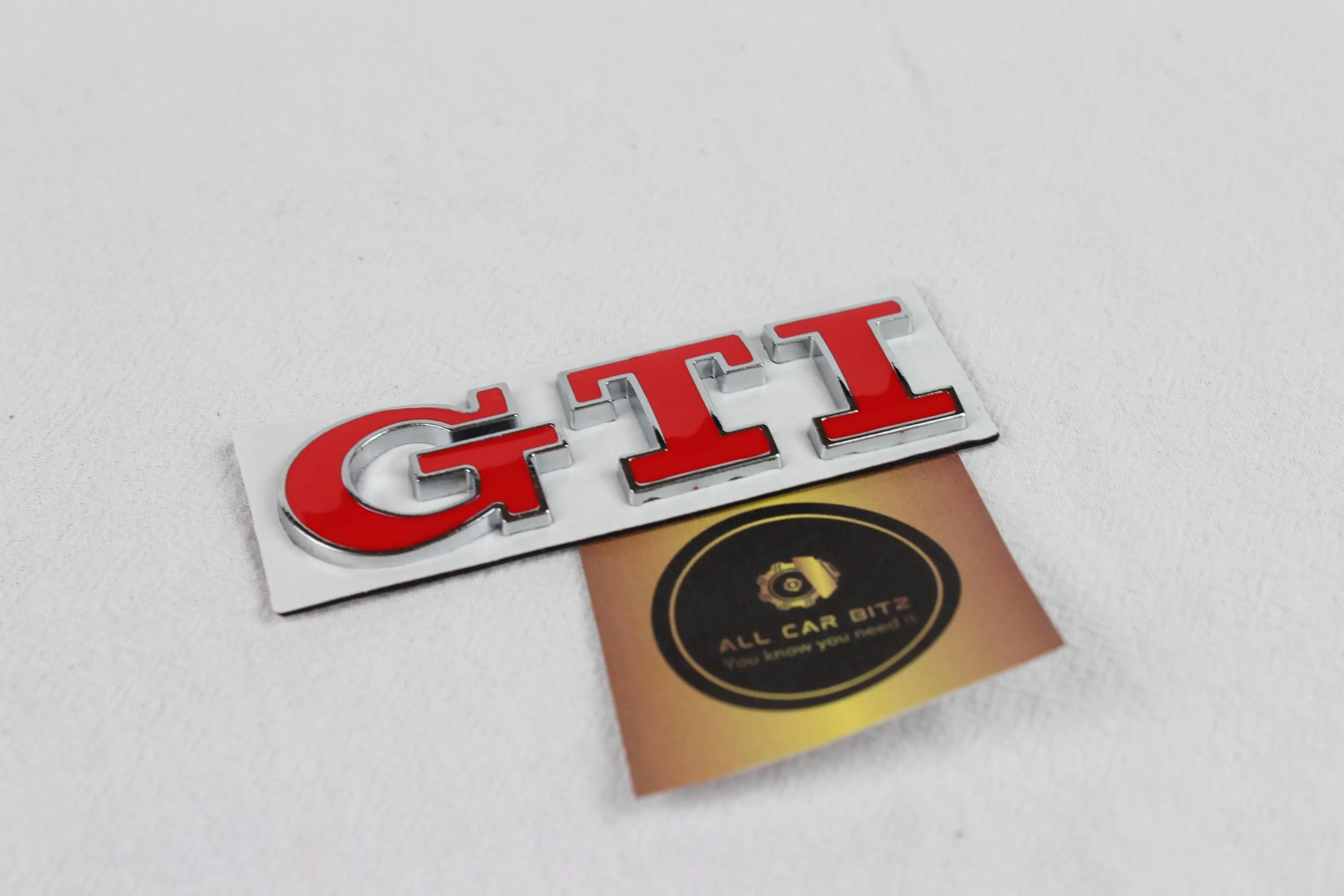 Red Volkswagen GTI logo badge