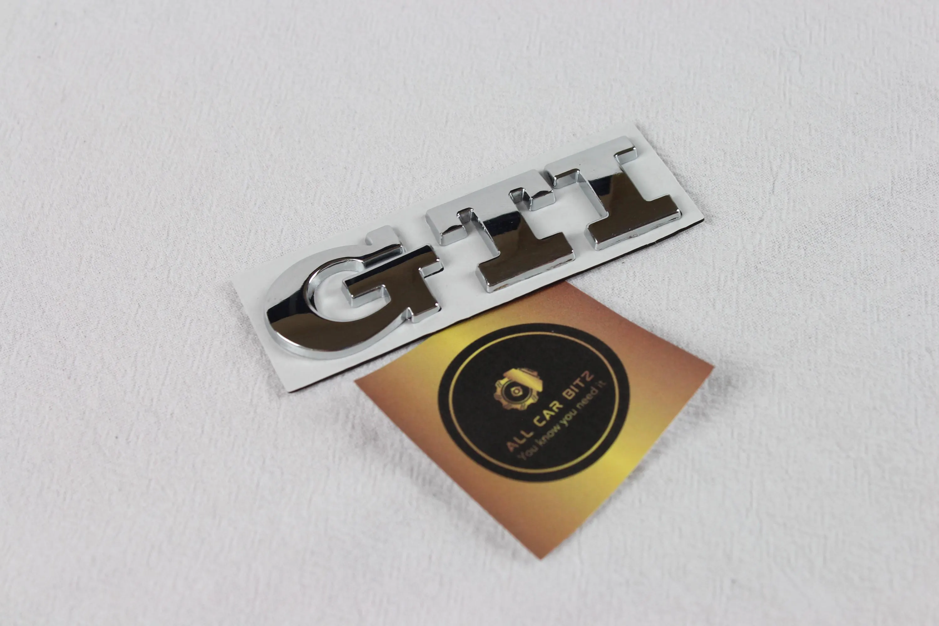 Chrome Volkswagen GTI logo badge