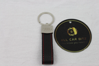 Audi Keychains: Silver Audi Logo with leather strap