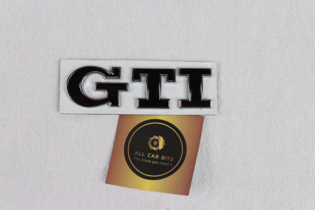 Volkswagen black and chrome GTI logo badge
