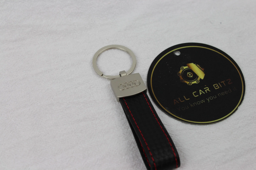 Audi Keychains: Silver Audi Logo with leather strap