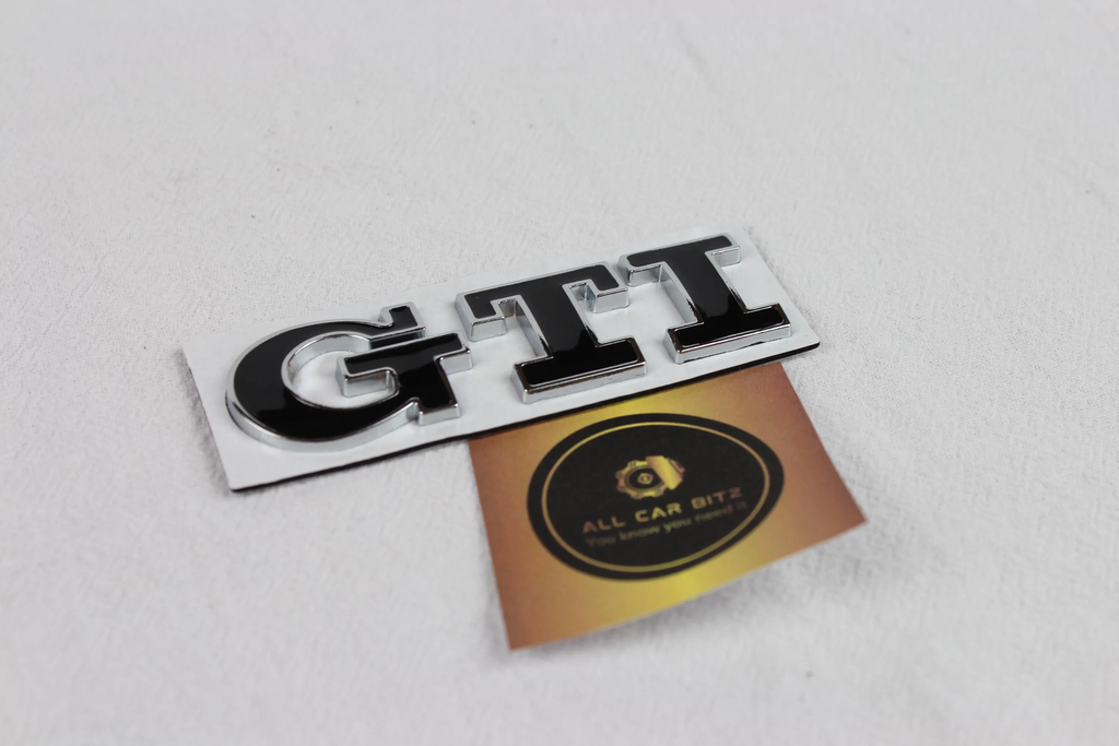 Volkswagen black and chrome GTI logo badge